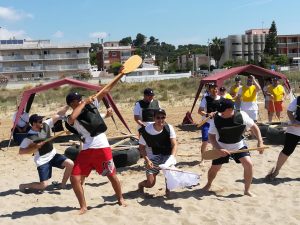 team dancing team building beach activity