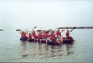 team building activity beach raft race